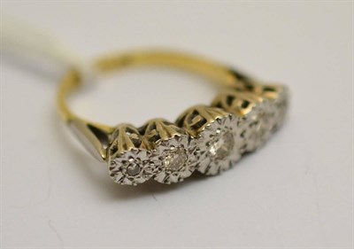 Lot 412 - An 18ct gold, platinum and diamond five stone ring