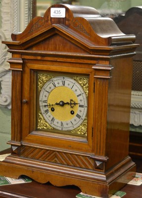 Lot 435 - A German eight day mahogany cased mantel clock, striking a twin gong