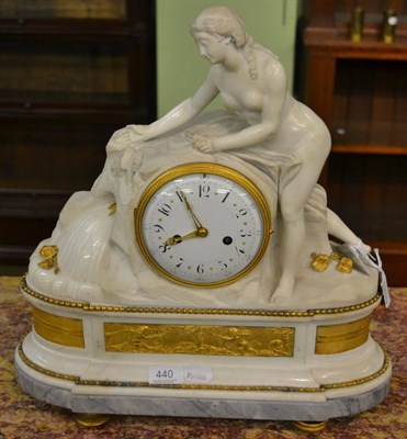 Lot 440 - An ormolu mounted and white marble striking mantel clock, circa 1890, surmounted by a maiden,...