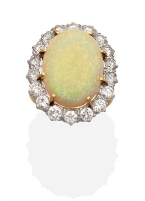 Lot 245 - An Opal and Diamond Cluster Ring, an oval cabochon opal in a claw setting, within a border of round