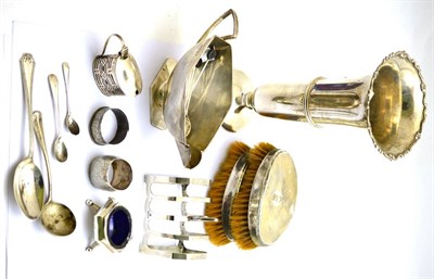 Lot 452 - A group of silver including a large bud vase, Art Deco sauce boat, two gentleman's brushes,...