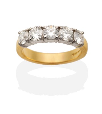Lot 246 - An 18 Carat Gold Diamond Ring, five round brilliant cut diamonds in claw settings, total...