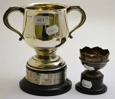 Lot 461 - A silver twin-handled trophy together with a small silver trophy (both a.f.)