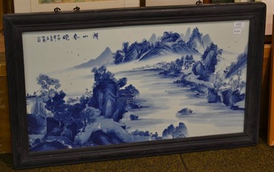 Lot 463 - A Chinese blue and white panel decorated with a landscape