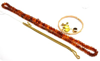 Lot 473 - A Bangle stamped '9CT', a rope necklace, earrings, amber coloured beads etc