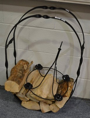 Lot 1032 - A blacksmith made log basket and light fitting