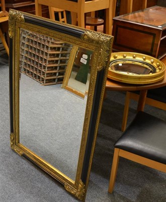 Lot 1034 - A small circular mirror and a modern mirror