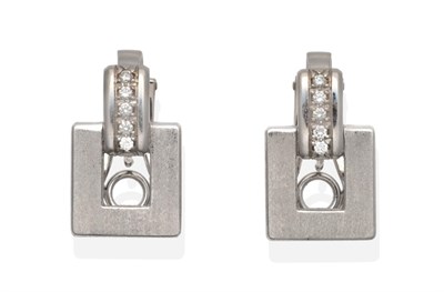 Lot 260 - A Pair of Diamond Earrings, a brushed polished square frame with a bright polished bar of round...