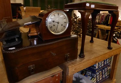 Lot 1104 - An early 20th century oak canteen containing a silver plated flatware service, book rest, two...