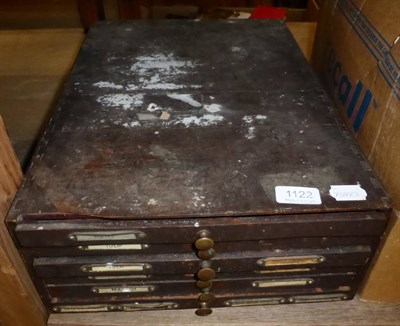 Lot 1122 - A six drawer cabinet containing a quantity of printers blocks