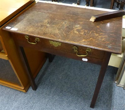 Lot 1148 - A George III oak side table fitted with a drawer (a.f.)