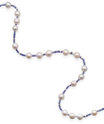 Lot 270 - A Tanzanite and Pearl Necklace, faceted tanzanite beads spaced by cultured pearls, to a diamond set