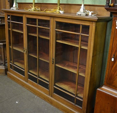 Lot 1203 - A glazed mahogany bookcase