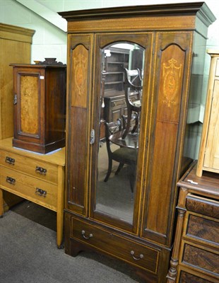 Lot 1208 - A satinwood inlaid mahogany mirror fronted wardrobe together with a pot cupboard with a walnut...