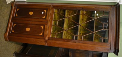 Lot 1214 - An early 20th century mahogany floor standing corner cabinet with glazed top