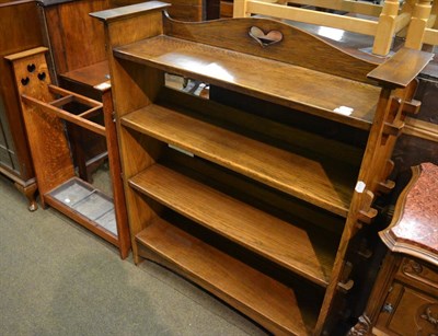 Lot 1223 - An oak Arts & Crafts bookshelf and a stick stand