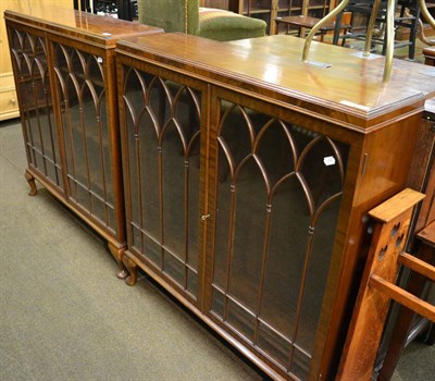 Lot 1224 - Two similar walnut glazed display cabinets