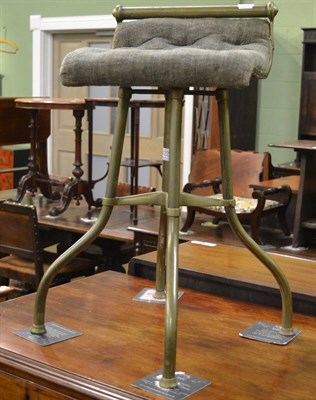 Lot 1228 - A 19th century upholstered brass framed harp stool by C H Hare