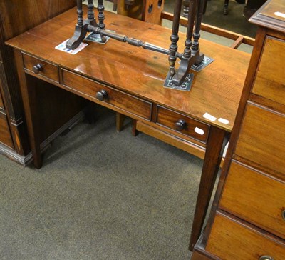 Lot 1231 - A mahogany single drawer side table with two false drawers