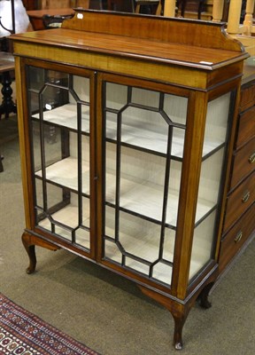 Lot 1234 - An Edwardian glazed display cabinet