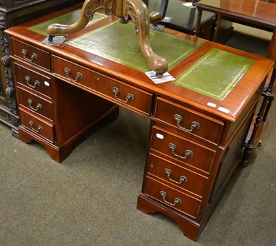 Lot 1242 - A reproduction yewwood pedestal desk