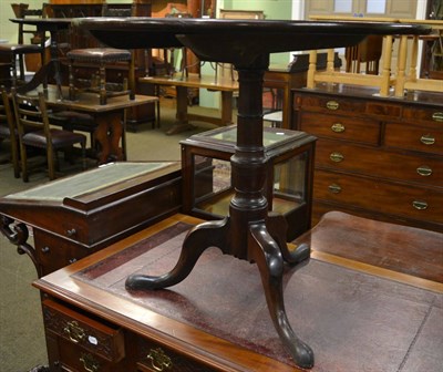 Lot 1246 - A George III mahogany tilt top tripod table