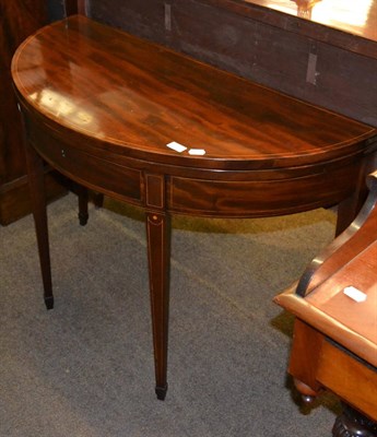 Lot 1253 - A mahogany inlaid flip top D-end table with drawer