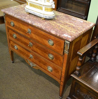 Lot 1261 - A 19th century French kingwood ormolu mounted commode with marble top