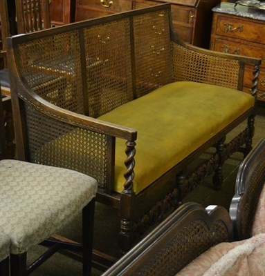 Lot 1269 - Bergere oak framed settee