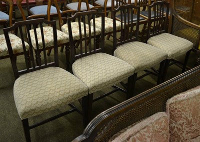 Lot 1270 - A set of four George III mahogany dining chairs