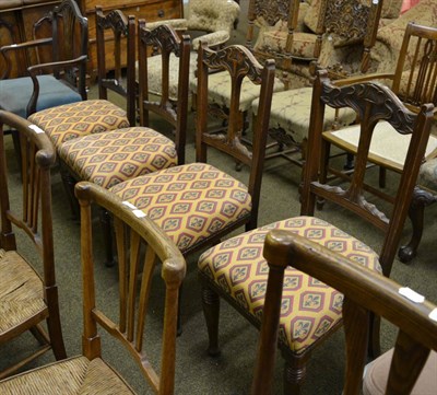 Lot 1277 - A set of four early 20th century dining chairs with carved backs and a Georgian mahogany open...