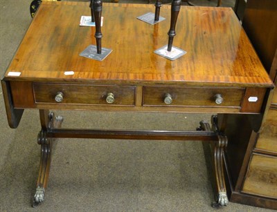 Lot 1293 - A mahogany sofa table with cross banded inlay on stretcher base