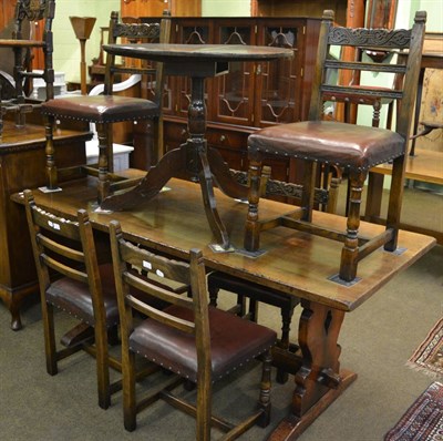 Lot 1299 - A reproduction oak refectory style table and a set of six similar style dining chairs with...