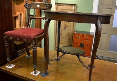 Lot 1308 - An Edwardian oval two tier window table and a Regency style dining chair