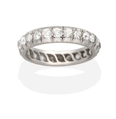 Lot 288 - A Diamond Eternity Ring, old cut diamonds in collet settings, total estimated diamond weight...