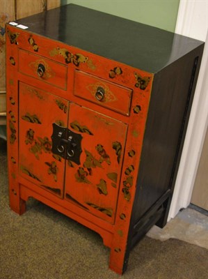 Lot 1313 - A chinoiserie lacquer cabinet