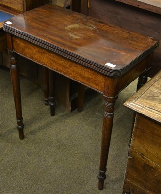 Lot 1328 - A 19th century mahogany fold over tea table