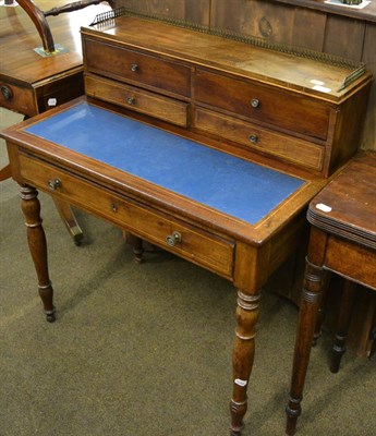 Lot 1329 - A Victorian mahogany ladies writing table with brass grille to the top