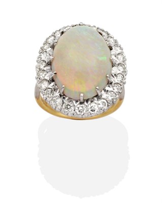 Lot 291 - An Opal and Diamond Cluster Ring, an oval cabochon opal in a claw setting within a border of...