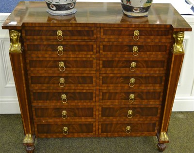 Lot 1343 - A Maitland-Smith Reproduction empire-style chest of fourteen drawers, 97cm width