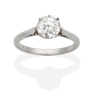 Lot 292 - A Solitaire Diamond Ring, a round brilliant cut diamond in a claw setting, to knife edge shoulders