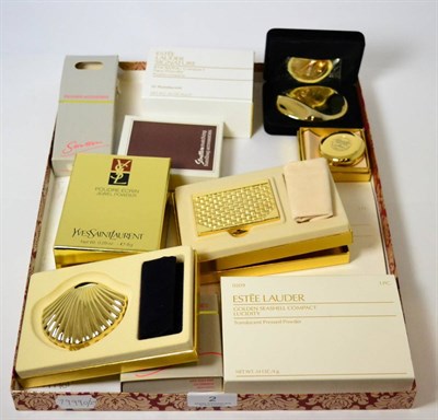 Lot 2 - Modern Estee Lauder Knowing, Storybook and Seashell gilt metal Compacts, another smaller...