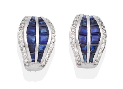Lot 293 - A Pair of Sapphire and Diamond Earrings, rounded lozenge shaped plaques with two bands of...