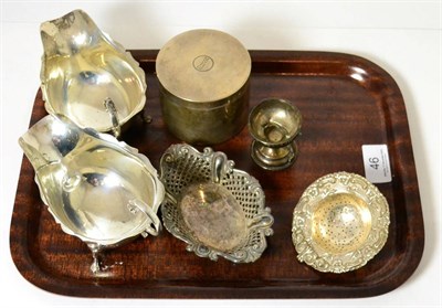 Lot 46 - Assorted silver including two sauce boats, a pierced dish, dressing table box and cover, tea...