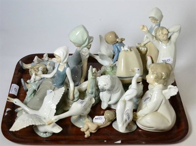 Lot 47 - Thirteen various Lladro figures including seated angel, various geese etc