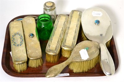 Lot 66 - Two silver backed Liberty & Co. dressing table brushes with enamel cabochons, another Liberty & Co.