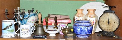 Lot 79 - A small bisque head doll, celluloid dolls, assorted china, metalware, games etc (on two shelves)