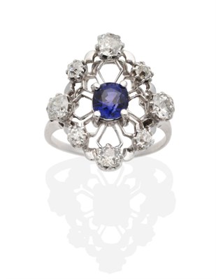 Lot 305 - An Early 20th Century Sapphire and Diamond Navette Ring, an oval cut sapphire in a claw...