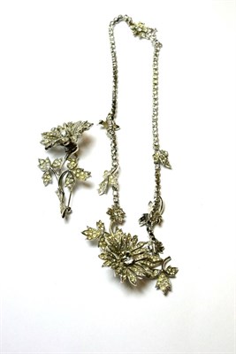 Lot 106 - A Christian Dior costume brooch and necklace, paste set floral design, both marked Christian...