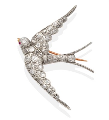 Lot 308 - A Late 19th Century Diamond Swallow Brooch, realistically modelled in flight with an open...